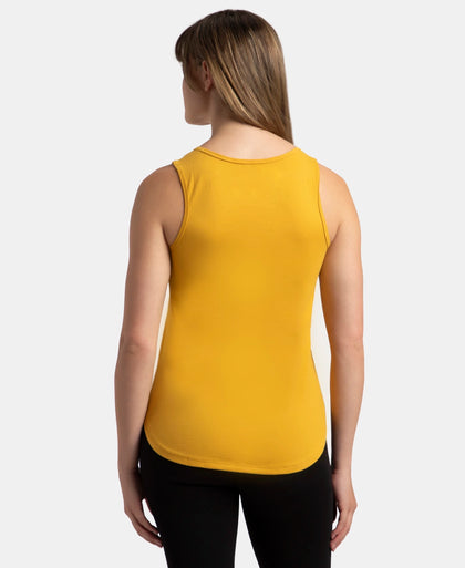 Super Combed Cotton Rich Solid Curved Hem Styled Tank Top - Golden Spice
