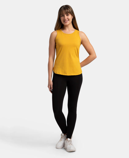 Super Combed Cotton Rich Solid Curved Hem Styled Tank Top - Golden Spice
